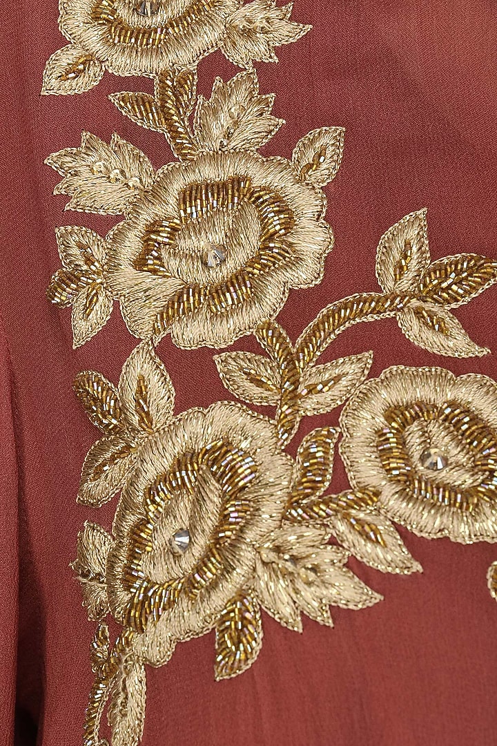 Sage brick red embroidered tunicavailable only at Pernia's Pop Up Shop.