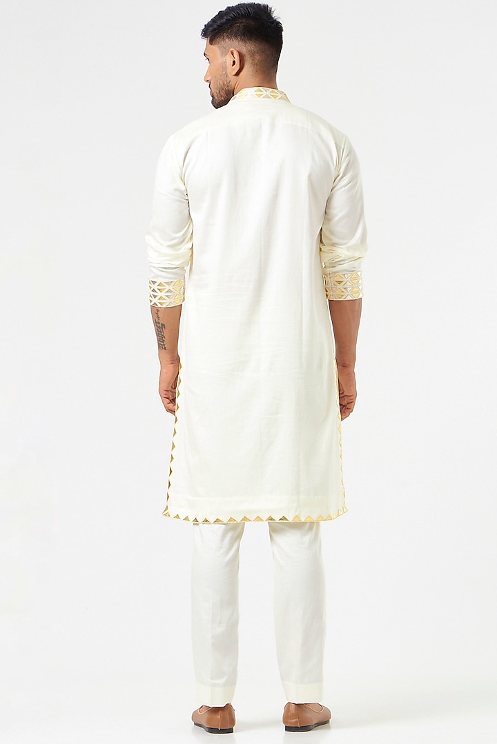 Ivory Patchwork Embroidered Kurta Set by SEVENDC MEN at Pernia's Pop Up Shop