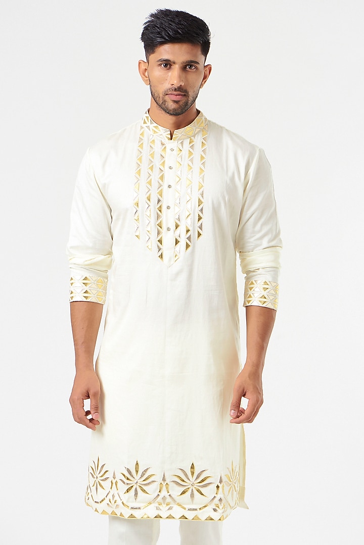 Ivory Patchwork Embroidered Kurta Set by SEVENDC MEN at Pernia's Pop Up Shop