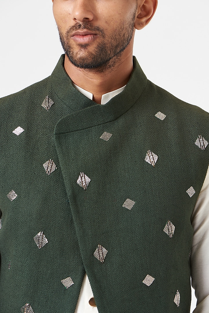 Dark Green Matka Silk Metallic Embroidered Asymmetric Nehru Jacket by SEVENDC MEN at Pernia's Pop Up Shop