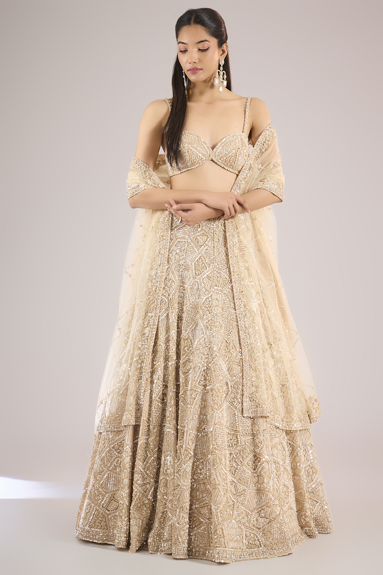 Light Gold Net Sequins Embroidered Bridal Lehenga Set by Seema Gujral at Pernia's Pop Up Shop