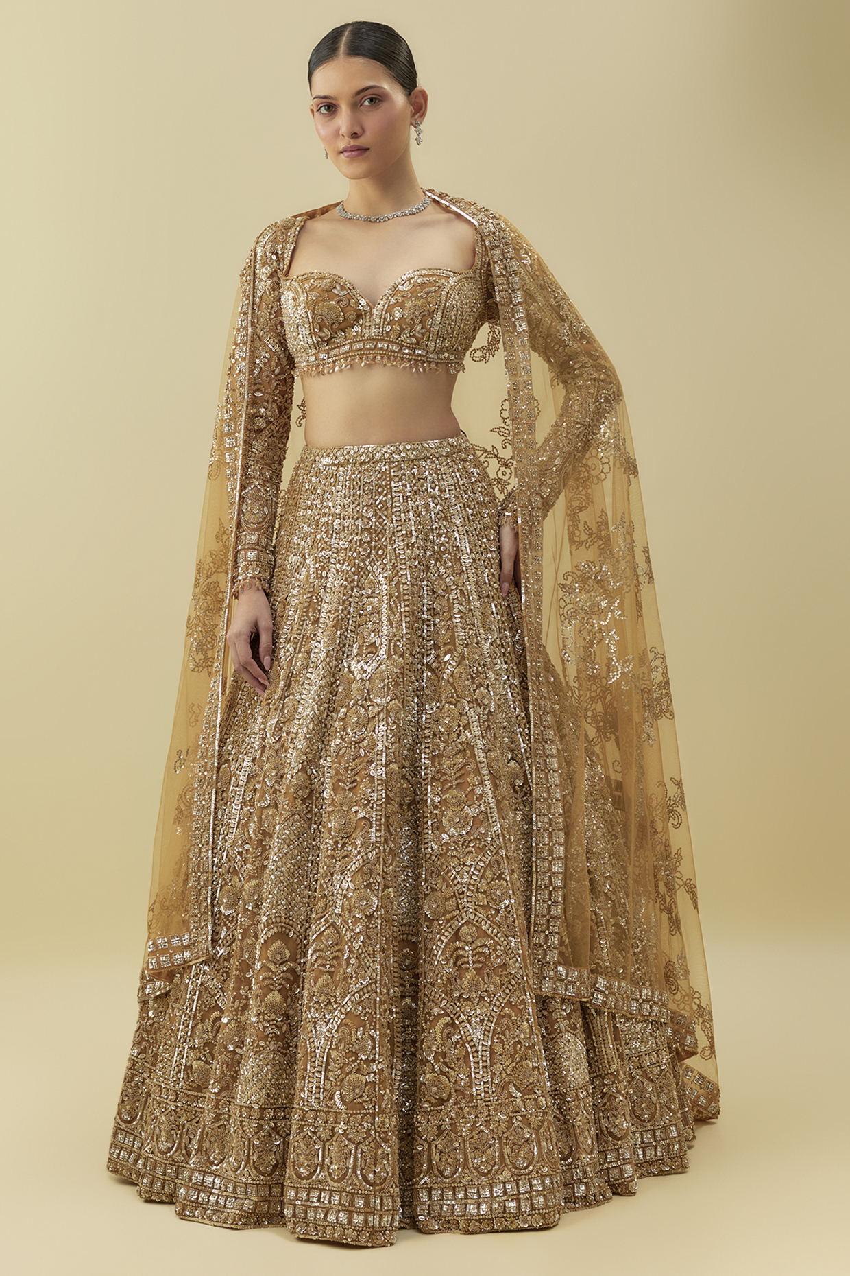 Antique Gold Net Sequins Embroidered Bridal Lehenga Set by Seema Gujral at Pernia's Pop Up Shop