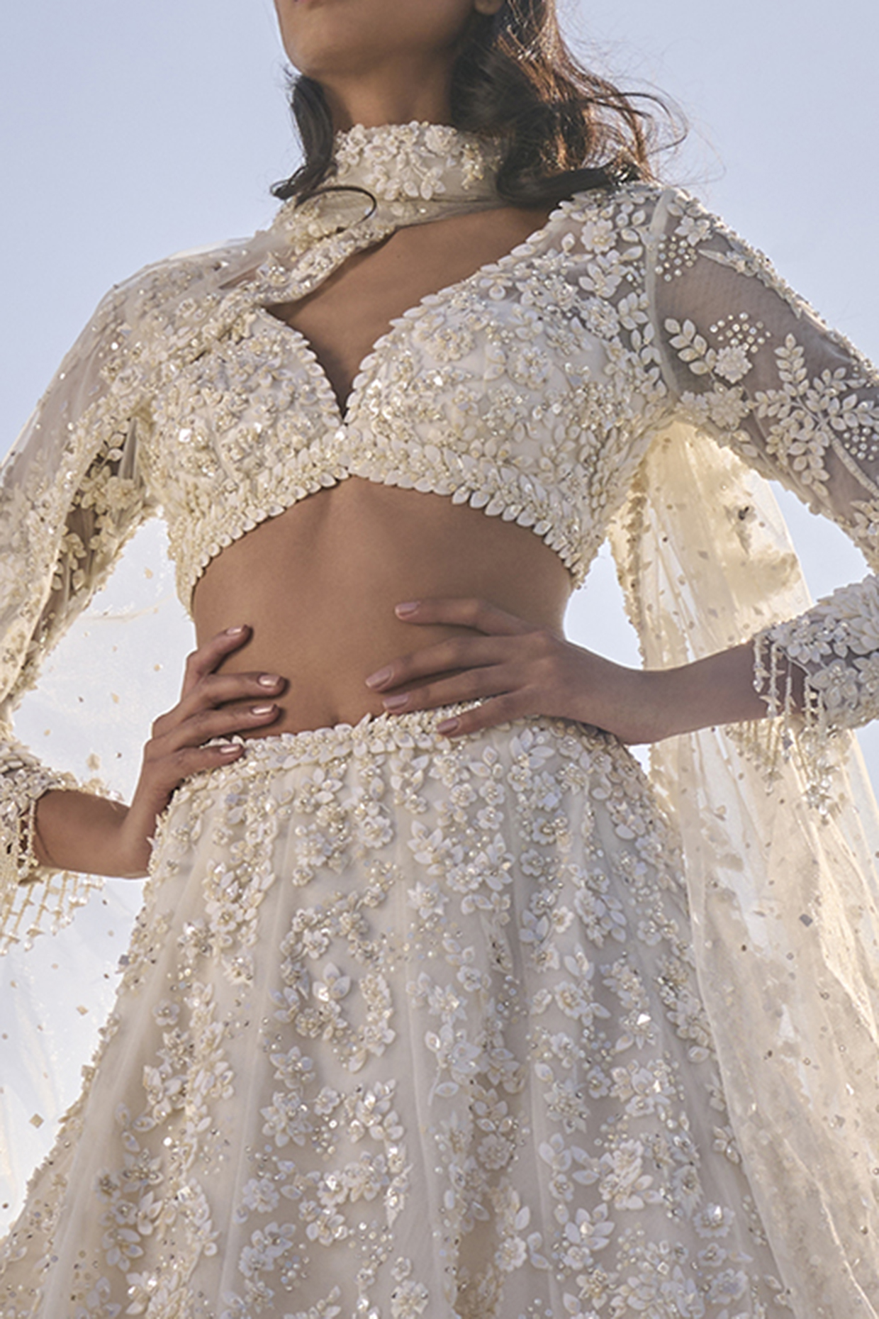 Cream Net Pearl Embroidered Bridal Lehenga Set by Seema