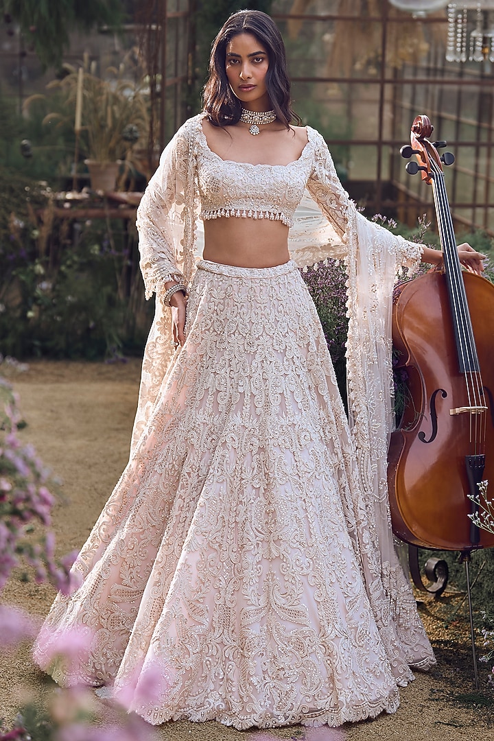 Powder Peach Net Pearl & Sequins Embroidered Bridal Lehenga Set by Seema Gujral at Pernia's Pop Up Shop
