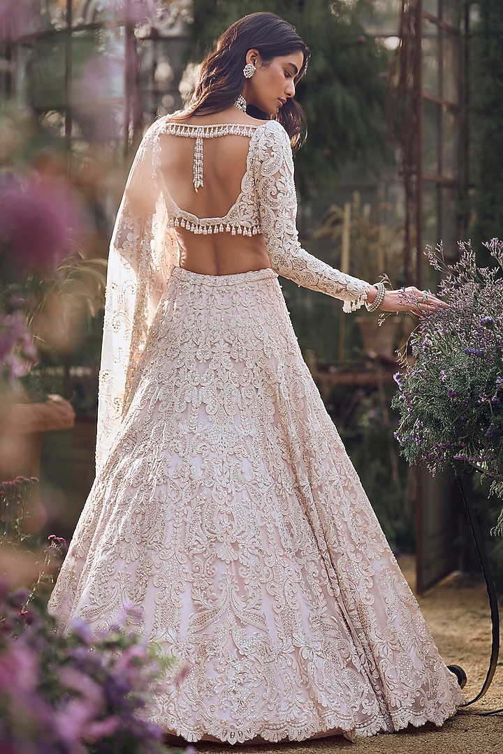 Powder Peach Net Pearl & Sequins Embroidered Bridal Lehenga Set by Seema Gujral at Pernia's Pop Up Shop