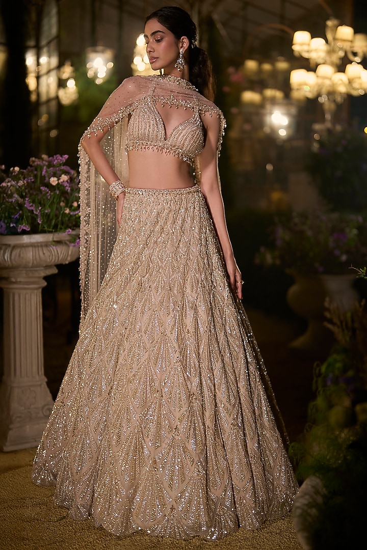 Light Gold Net Sequin Embroidered Bridal Lehenga Set by Seema Gujral at Pernia's Pop Up Shop