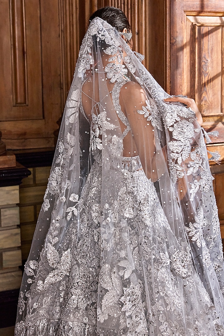 Metallic Silver Net Embroidered Bridal Lehenga Set by Seema Gujral at Pernia's Pop Up Shop