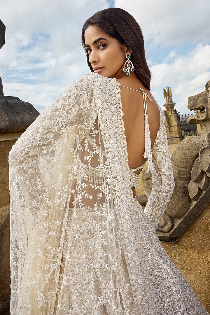 Ivory Net Sequins & Pearl Embroidered Bridal Lehenga Set by Seema Gujral at Pernia's Pop Up Shop