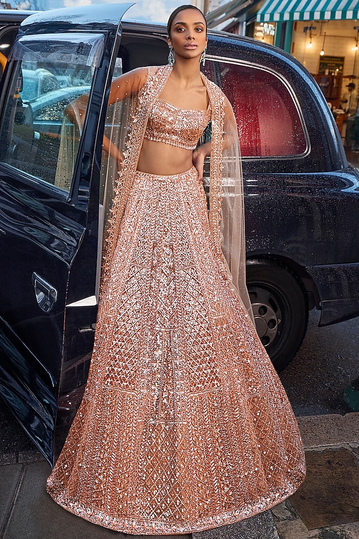 Peach Net Sequins Embroidered Lehenga Set by Seema Gujral
