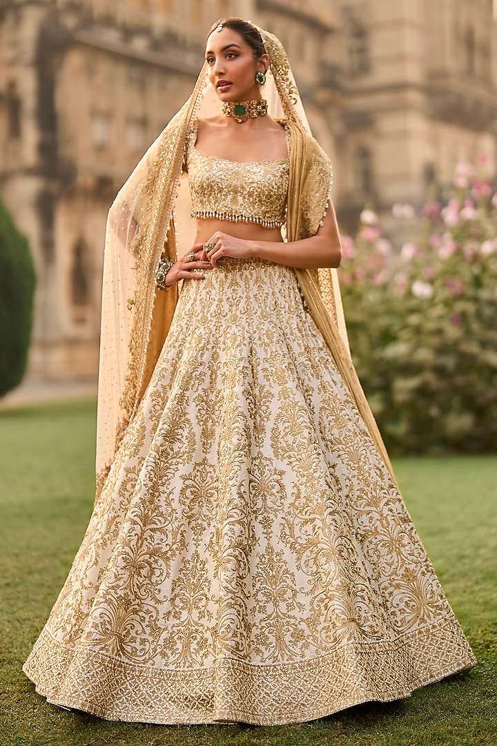 Ivory Raw Silk Thread Work Bridal Lehenga Set by Seema Gujral at Pernia's Pop Up Shop