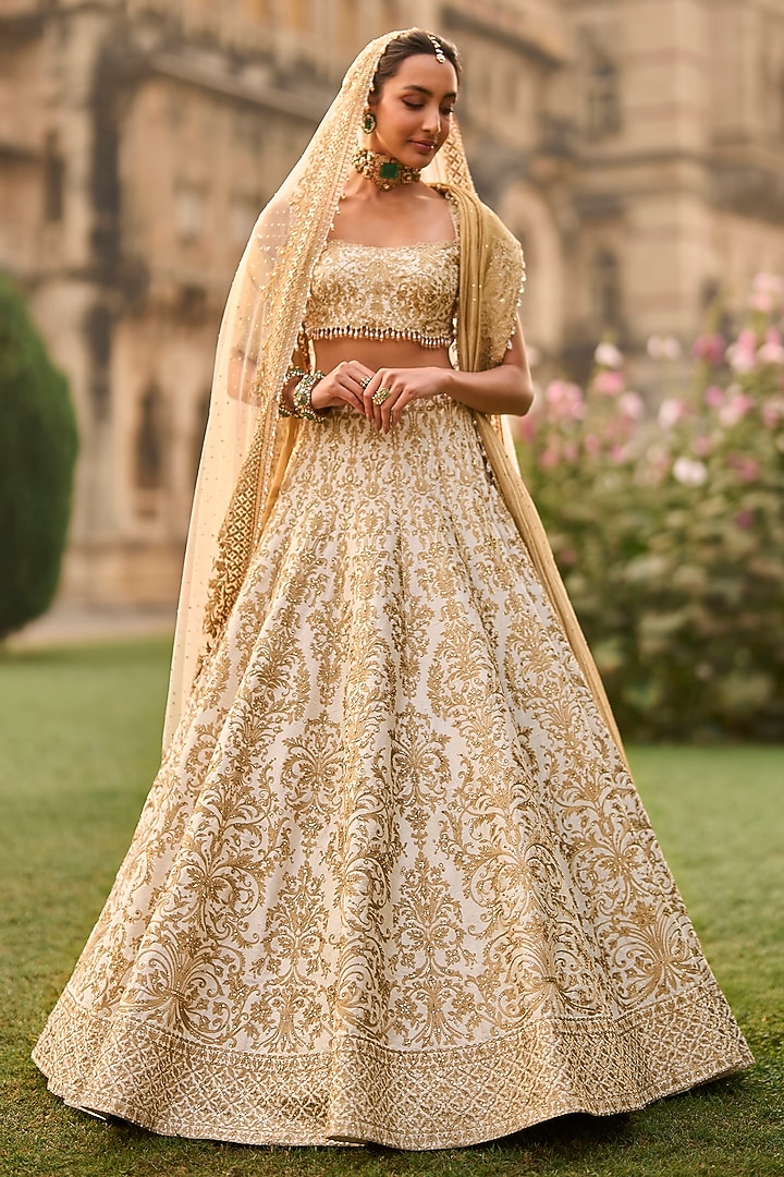 Ivory Raw Silk Thread Work Bridal Lehenga Set by Seema Gujral at Pernia's Pop Up Shop