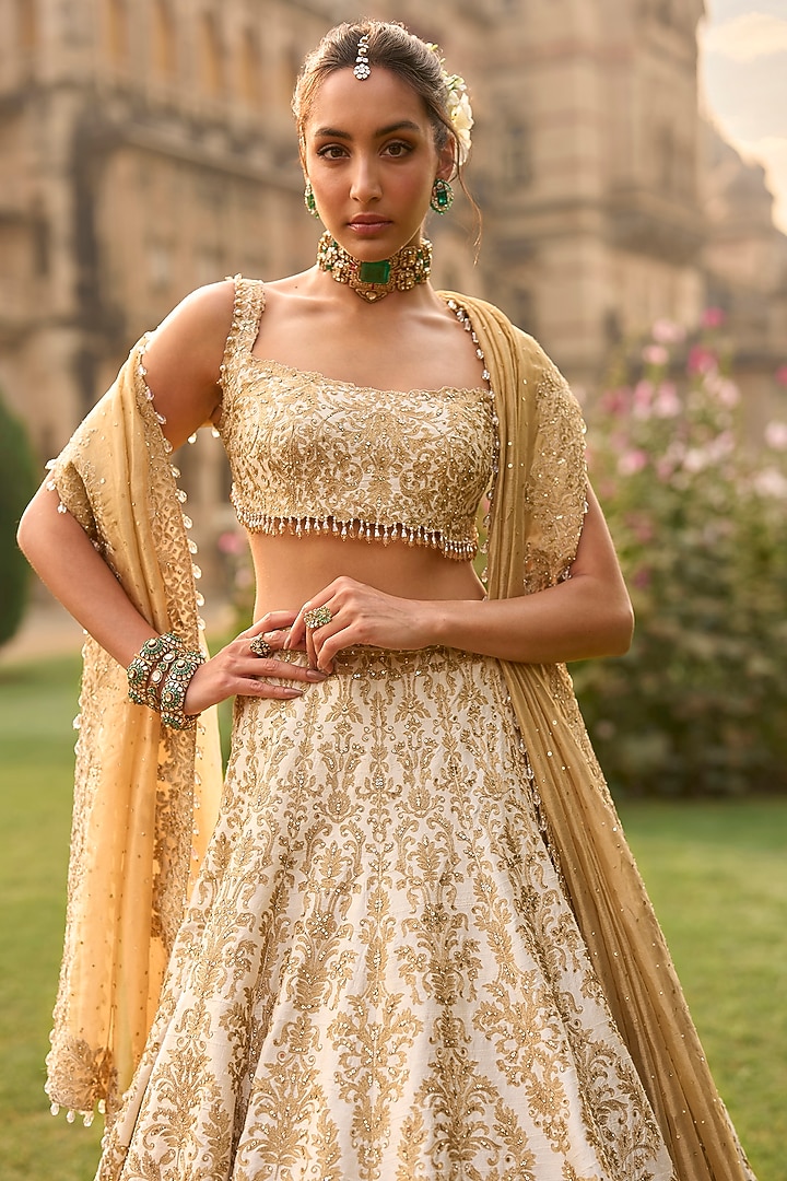 Ivory Raw Silk Thread Work Bridal Lehenga Set by Seema Gujral at Pernia's Pop Up Shop