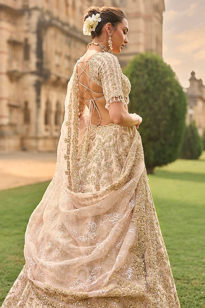 Powder Peach Raw Silk Sequins Embroidered Bridal Lehenga Set by Seema Gujral at Pernia's Pop Up Shop