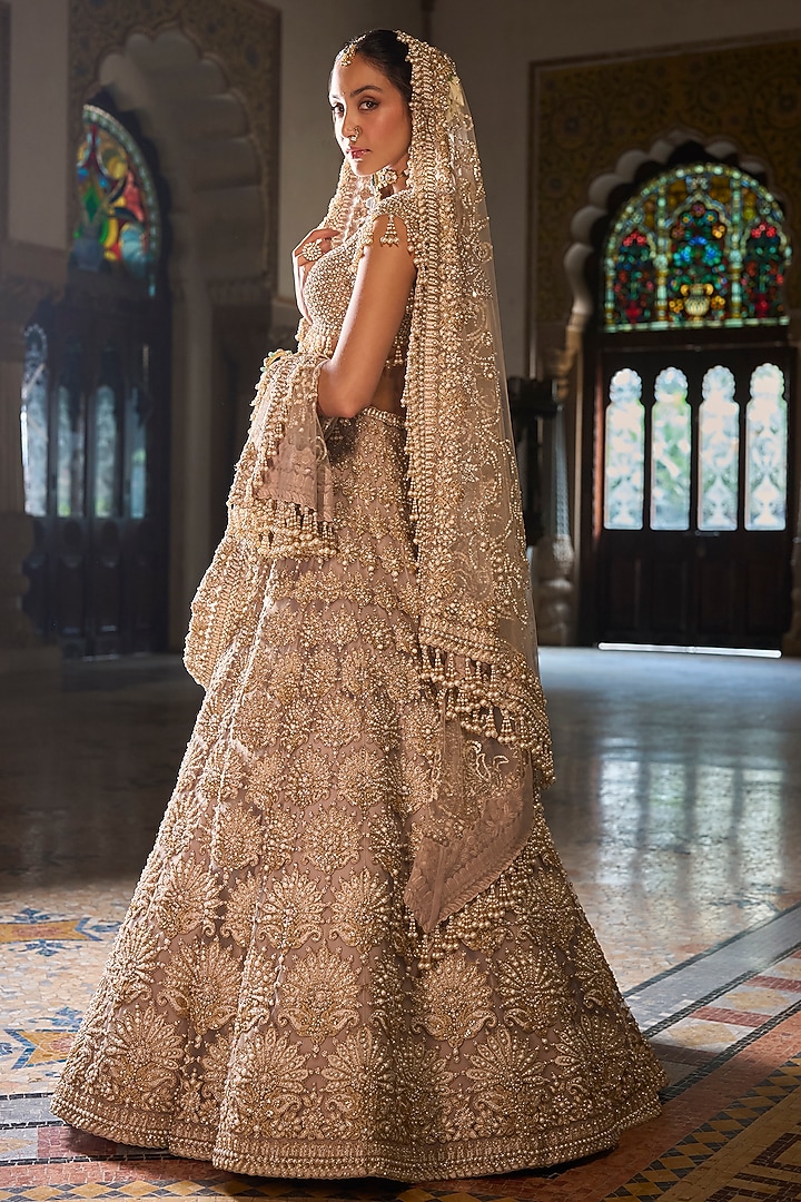 Champagne Net Sequins Embroidered Bridal Lehenga Set by Seema Gujral at Pernia's Pop Up Shop