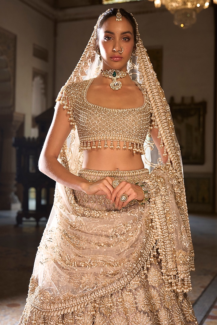 Champagne Net Sequins Embroidered Bridal Lehenga Set by Seema Gujral at Pernia's Pop Up Shop