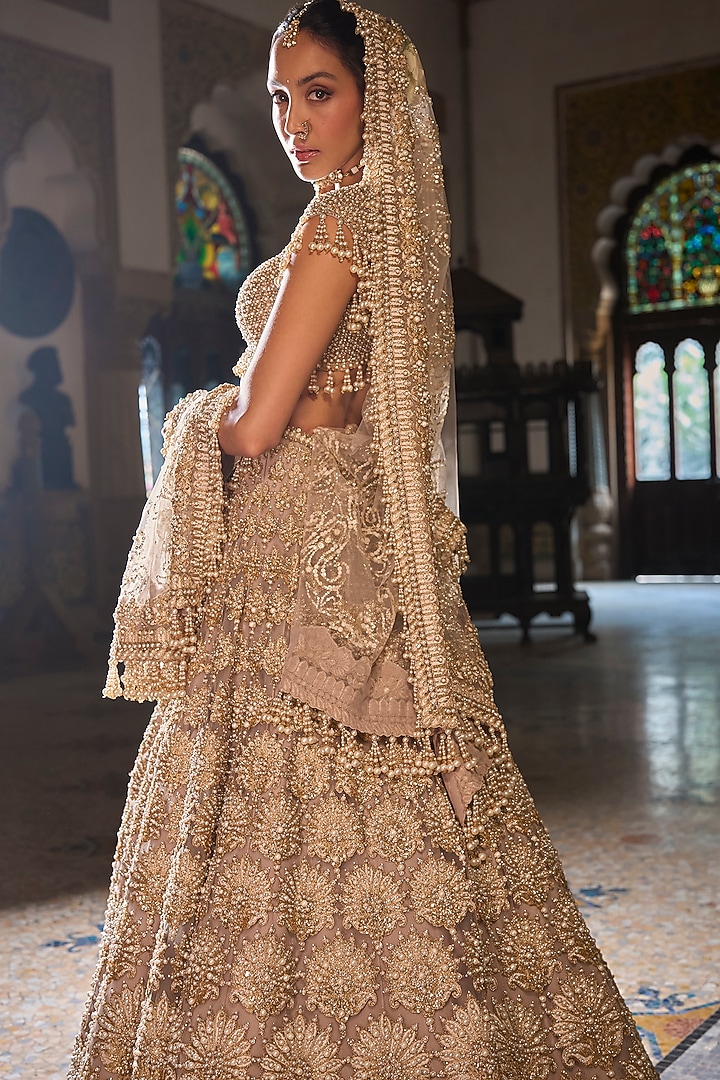 Champagne Net Sequins Embroidered Bridal Lehenga Set by Seema Gujral at Pernia's Pop Up Shop