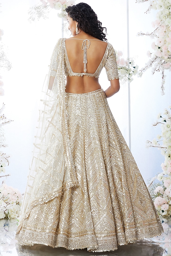 Antique Gold Metallic Sequins Embroidered Bridal Lehenga Set by Seema Gujral at Pernia's Pop Up Shop