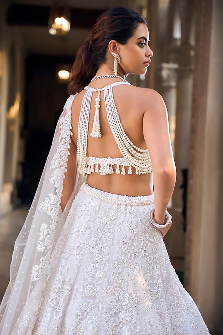 Ivory Net Pearl & Sequin Embroidered Bridal Lehenga Set by Seema Gujral at Pernia's Pop Up Shop