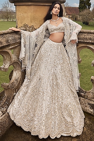 Cream Net Mirror & Thread Embroidered Lehenga Set by Seema Gujral