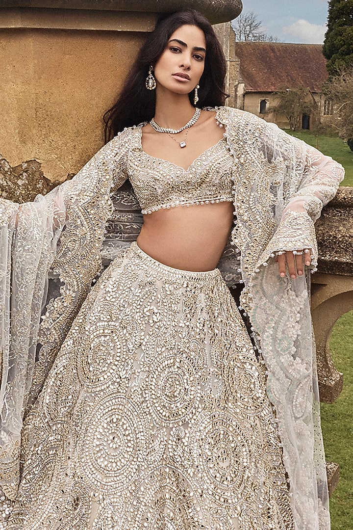 Cream Net Mirror & Thread Embroidered Bridal Lehenga Set by Seema Gujral at Pernia's Pop Up Shop