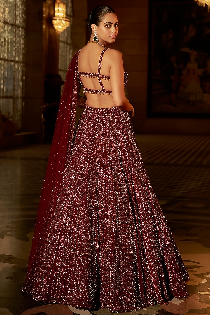 Maroon Net Sequins Embroidered Bridal Lehenga Set by Seema Gujral at Pernia's Pop Up Shop