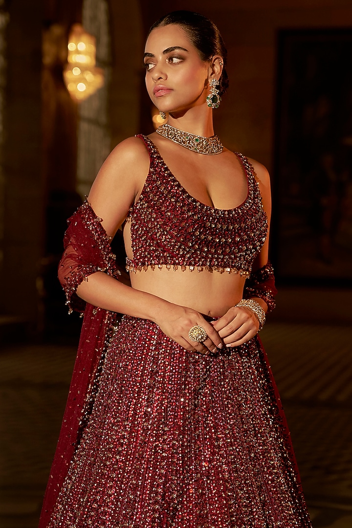 Maroon Net Sequins Embroidered Bridal Lehenga Set by Seema Gujral at Pernia's Pop Up Shop