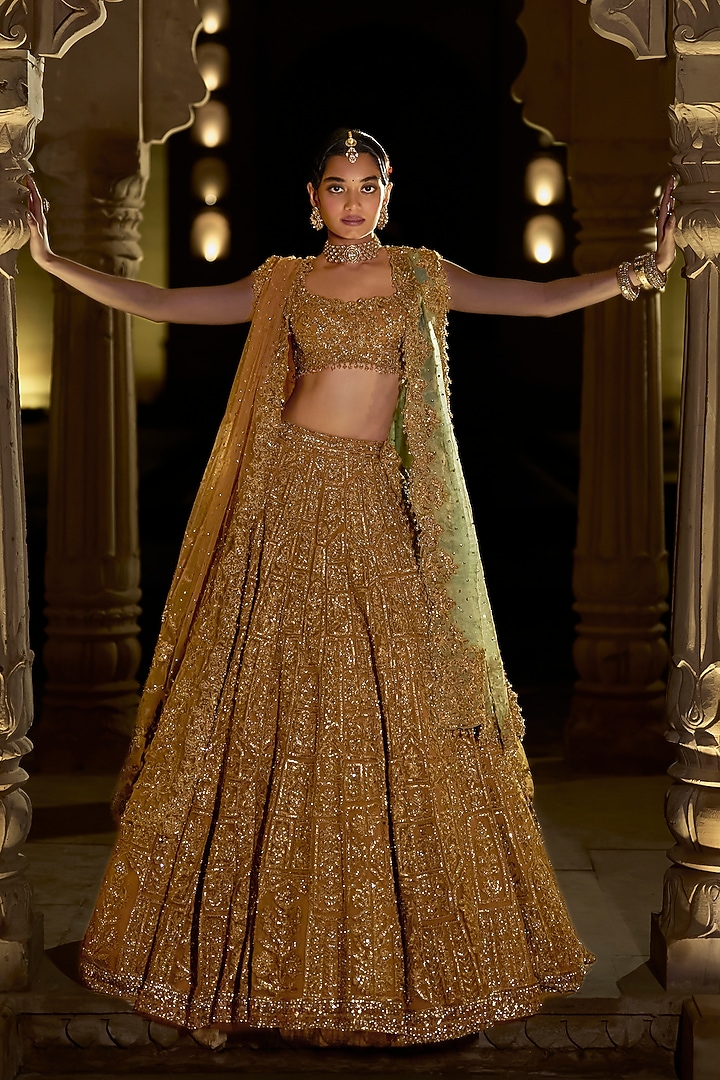 Antique Gold Net Thread Embroidered Bridal Lehenga Set by Seema Gujral at Pernia's Pop Up Shop