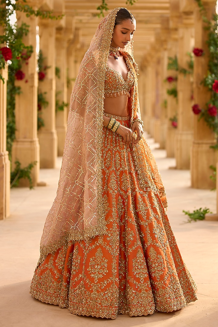 Burnt Orange Raw Silk Thread Embroidered Bridal Lehenga Set by Seema Gujral at Pernia's Pop Up Shop