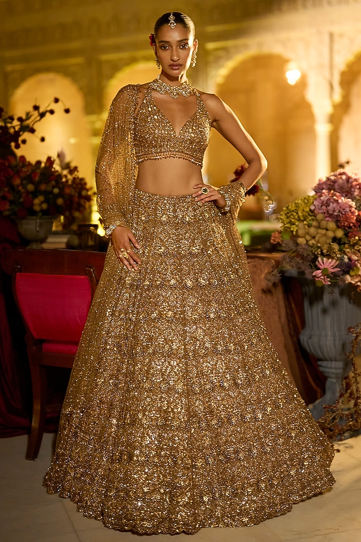 Antique Gold Net Sequins Embroidered Bridal Lehenga Set by Seema Gujral at Pernia's Pop Up Shop