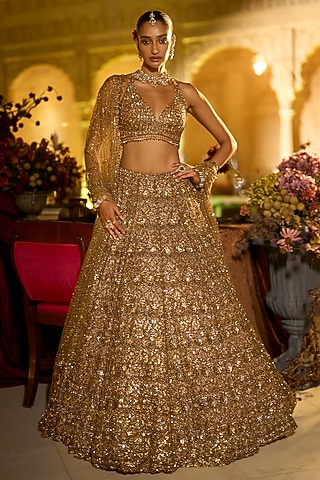 Antique Gold Net Sequins Embroidered Lehenga Set by Seema Gujral