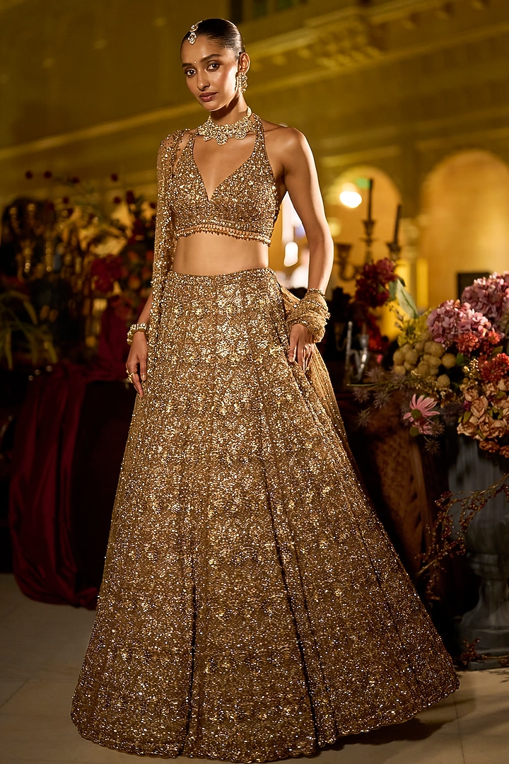 Antique Gold Net Sequins Embroidered Bridal Lehenga Set by Seema Gujral at Pernia's Pop Up Shop