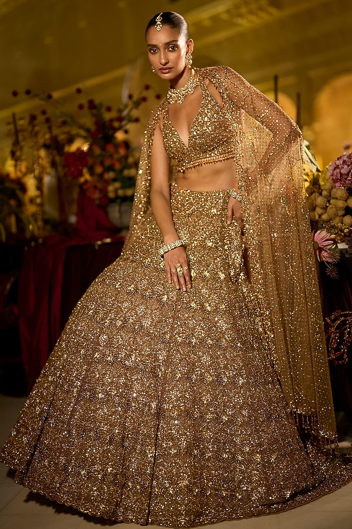 Antique Gold Net Sequins Embroidered Bridal Lehenga Set by Seema Gujral at Pernia's Pop Up Shop
