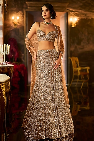 Antique Gold Net Sequins Embroidered Flared Skirt Set by Seema Gujral