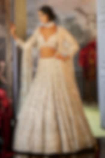 Ivory Net Sequins & Pearl Embroidered Bridal Lehenga Set by Seema Gujral at Pernia's Pop Up Shop