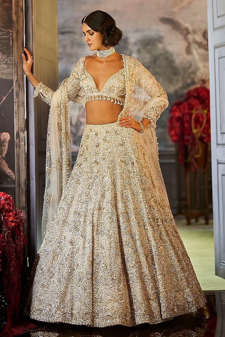 Ivory Net Sequins & Pearl Embroidered Bridal Lehenga Set by Seema Gujral at Pernia's Pop Up Shop