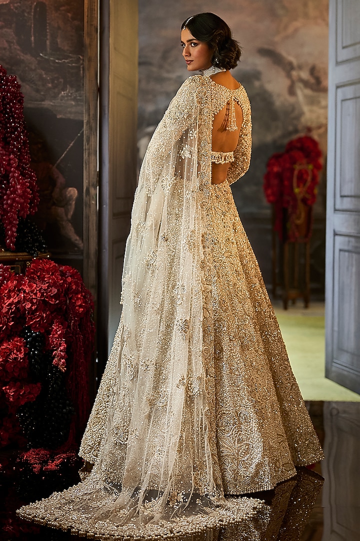 Ivory Net Sequins & Pearl Embroidered Bridal Lehenga Set by Seema Gujral at Pernia's Pop Up Shop