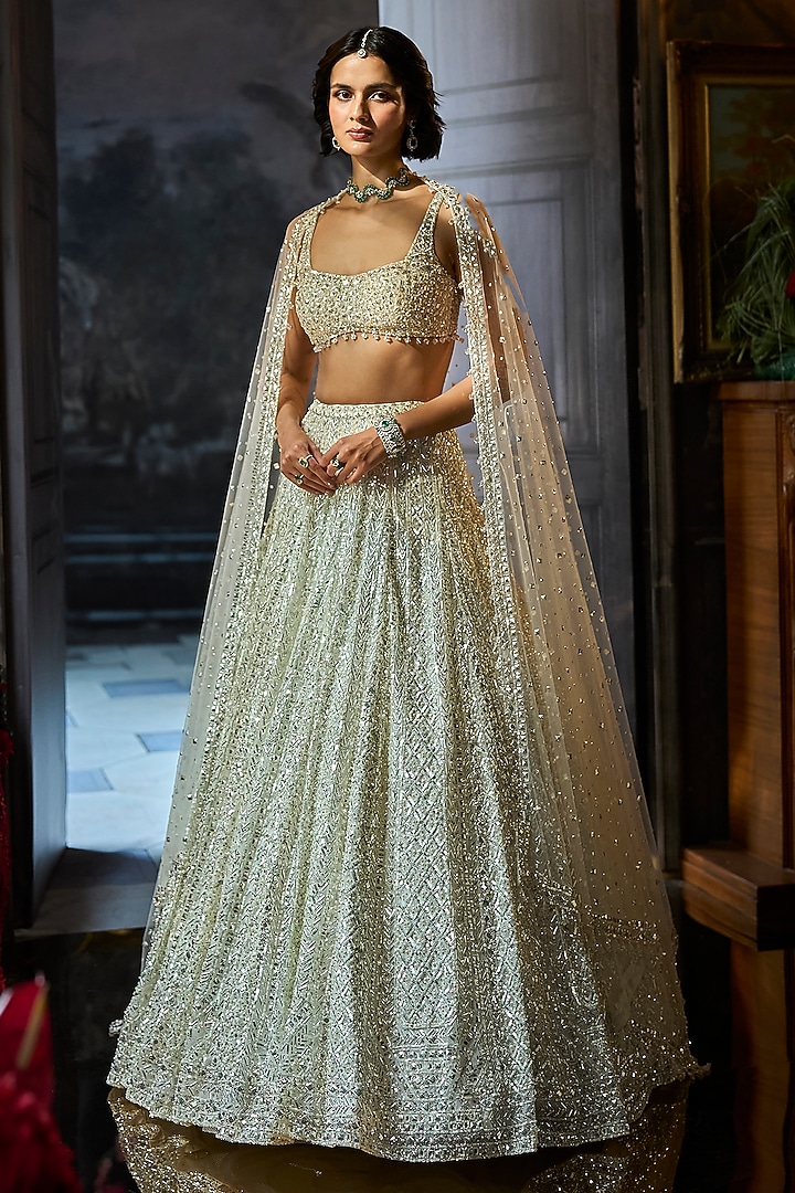 Milky White Net Sequins Embroidered Bridal Lehenga Set by Seema Gujral at Pernia's Pop Up Shop