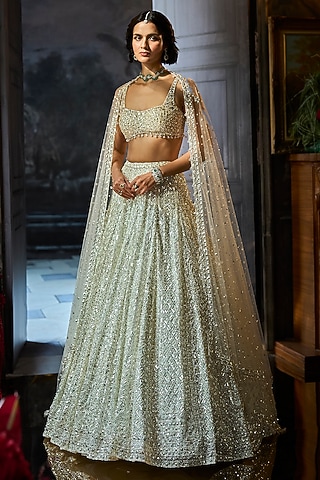 Milky White Net Sequins Embroidered Lehenga Set by Seema Gujral