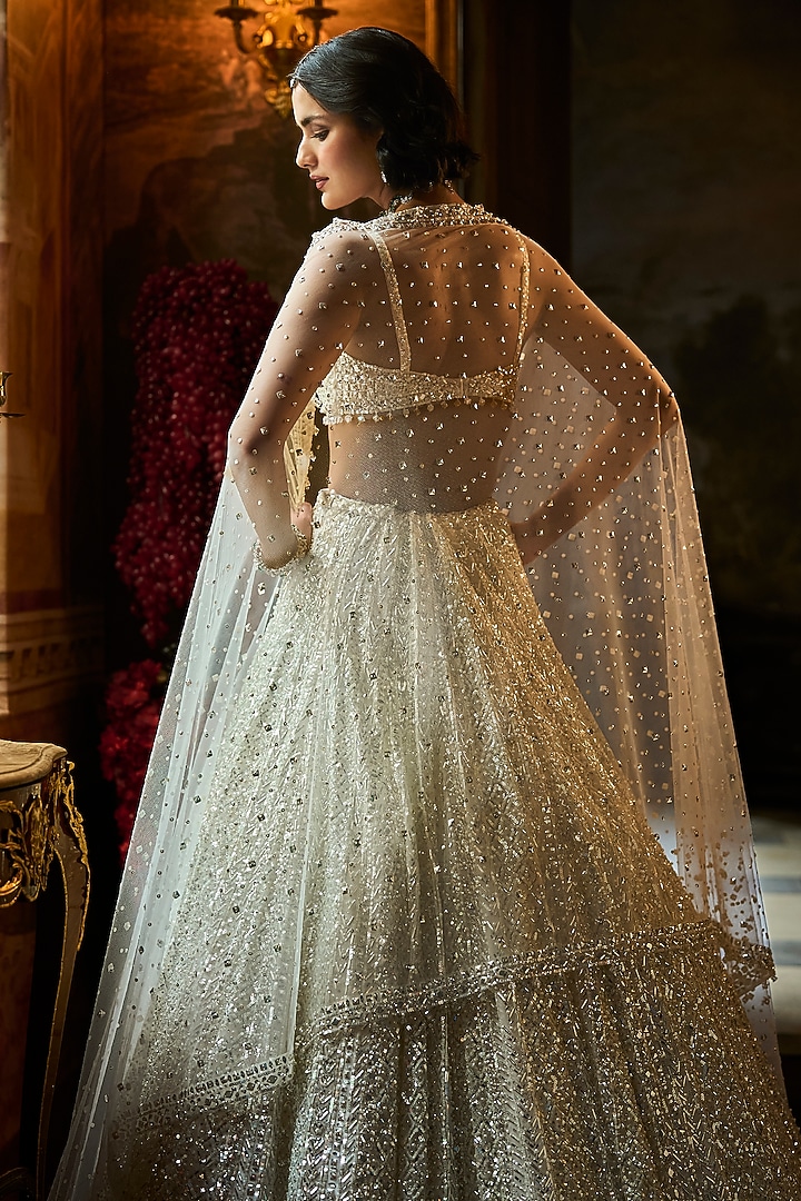 Milky White Net Sequins Embroidered Bridal Lehenga Set by Seema Gujral at Pernia's Pop Up Shop