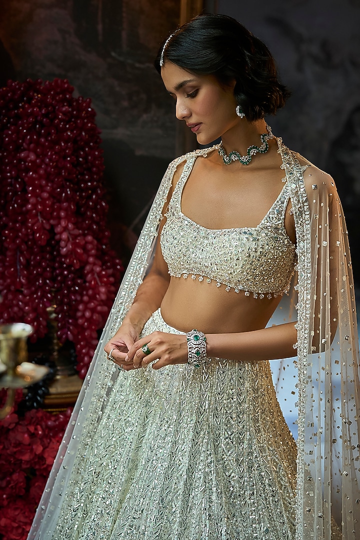 Milky White Net Sequins Embroidered Bridal Lehenga Set by Seema Gujral at Pernia's Pop Up Shop