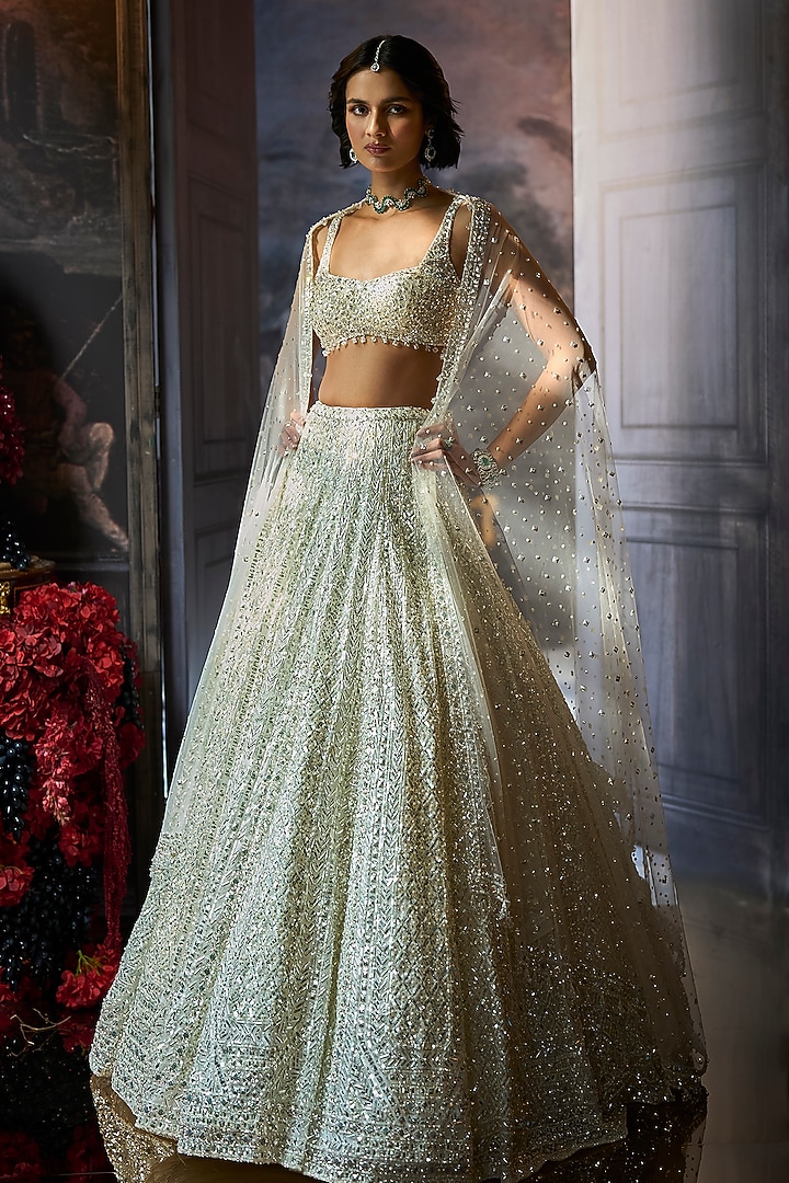 Milky White Net Sequins Embroidered Bridal Lehenga Set by Seema Gujral at Pernia's Pop Up Shop