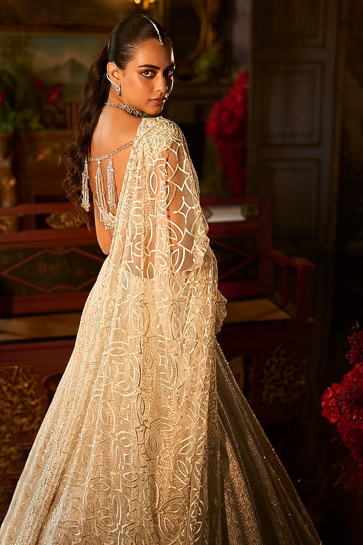 Ivory Net Sequins Embroidered Bridal Lehenga Set by Seema Gujral at Pernia's Pop Up Shop