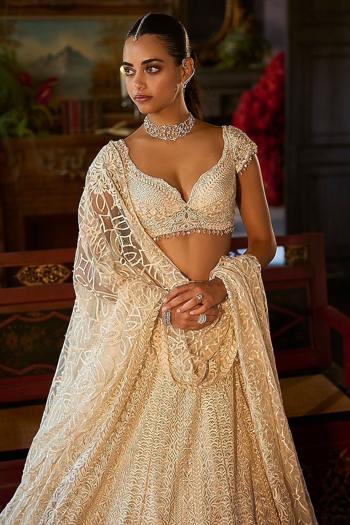 Ivory Net Sequins Embroidered Bridal Lehenga Set by Seema Gujral at Pernia's Pop Up Shop