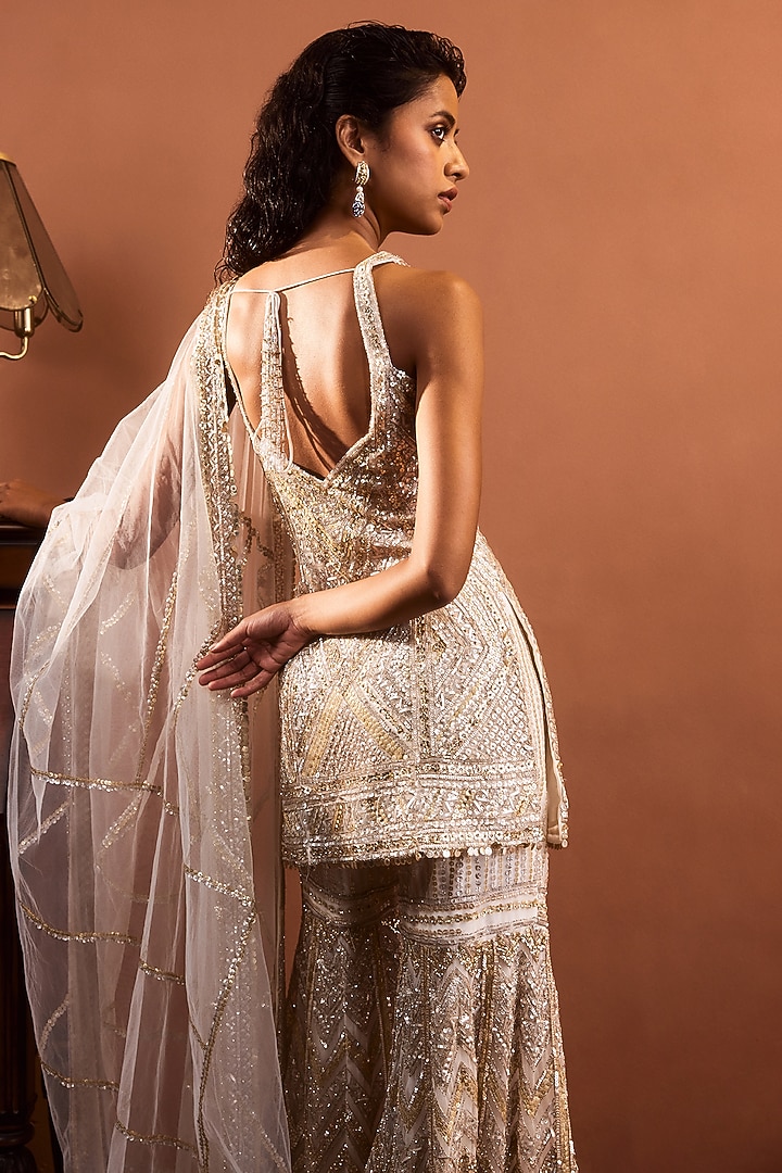 Ivory Net Sequins Embroidered Gharara Set by Seema Gujral at Pernia's Pop Up Shop