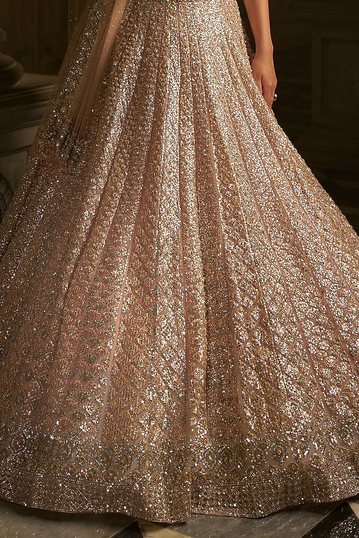 Powder Peach Net Sequins Embroidered Bridal Lehenga Set by Seema Gujral at Pernia's Pop Up Shop