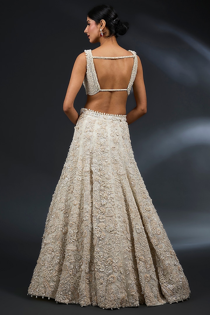 Ivory Net Thread & Pearl Embroidered Bridal Lehenga Set by Seema Gujral at Pernia's Pop Up Shop