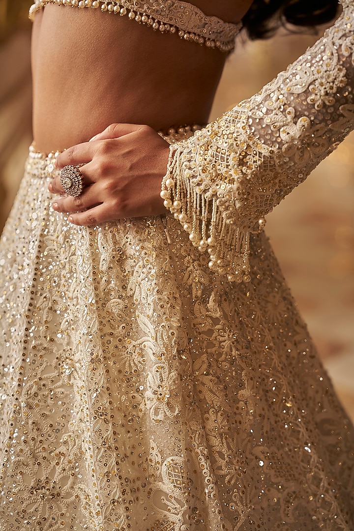 Ivory Net Floral Embroidered Bridal Lehenga Set by Seema Gujral at Pernia's Pop Up Shop