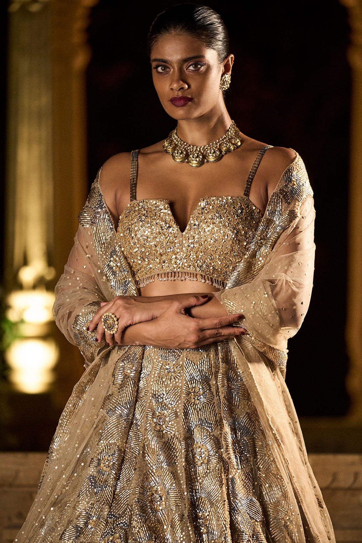 WeddingWire India - Wearing a champagne gold lehenga with stunning jewellery,  this bride is stealing our hearts! {Photo: Cupcake Productions} | Facebook