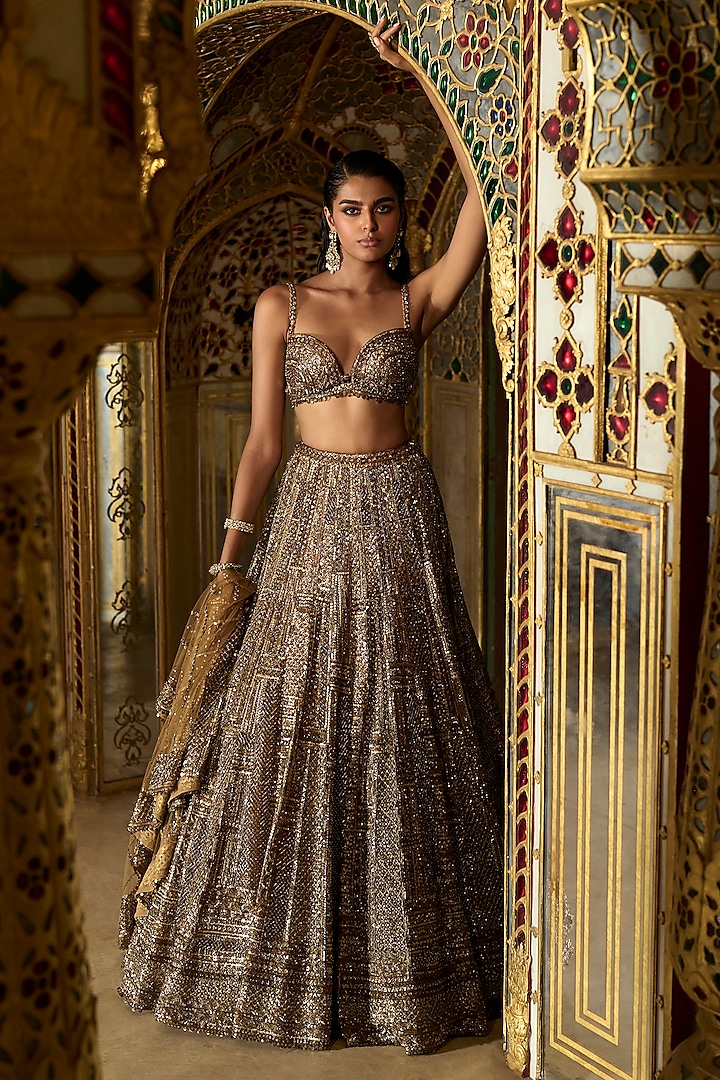 Antique Gold Net Sequins Embroidered Bridal Lehenga Set by Seema Gujral at Pernia's Pop Up Shop