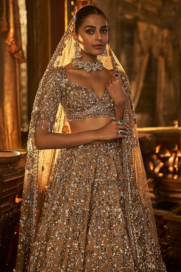 Antique Gold Tissue Silk Embroidered Bridal Lehenga Set by Seema Gujral at Pernia's Pop Up Shop